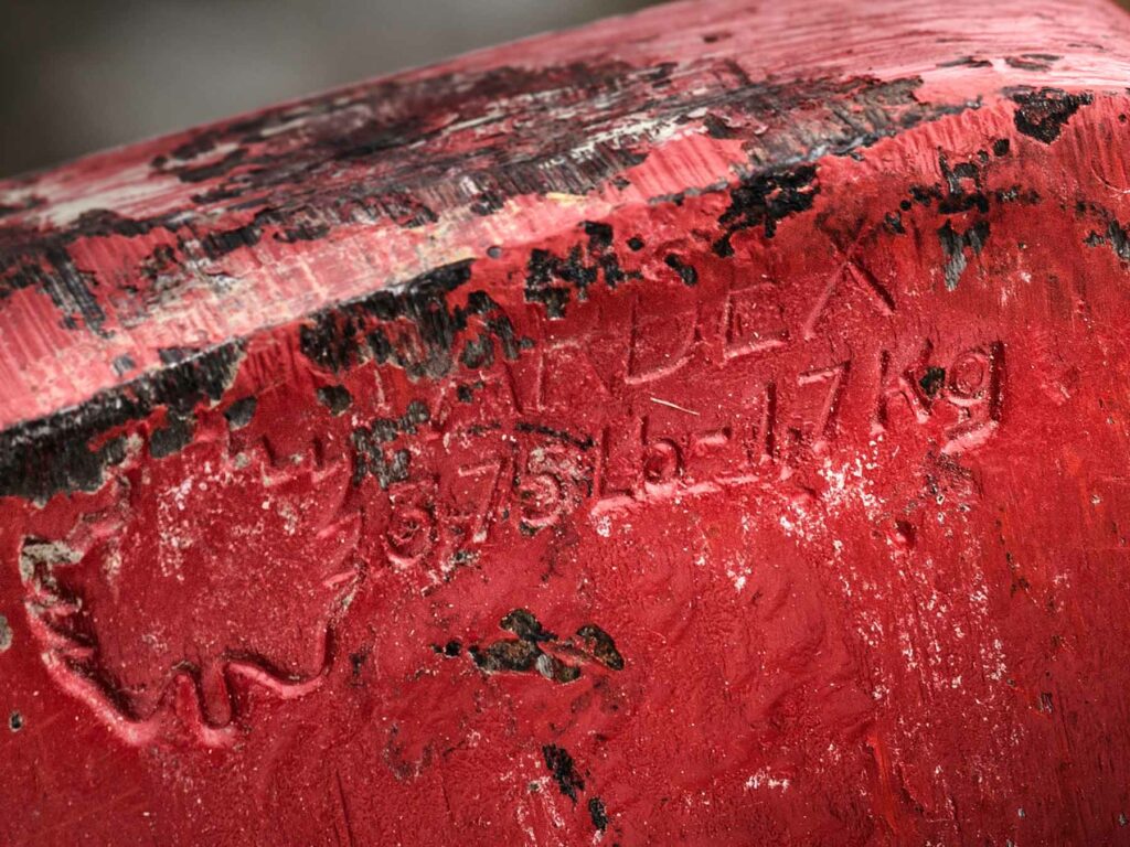Close-up of red ardex head stamp